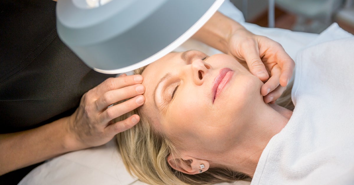 Examining Womans Face 1200x628 Facebook 