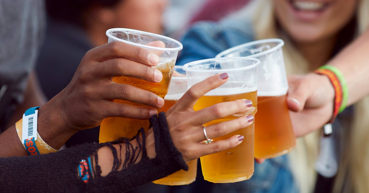 hands toasting in beer at festival 1200x628 facebook
