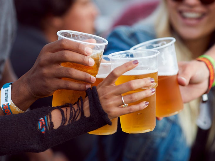 hands toasting in beer at festival 732x549 thumbnail