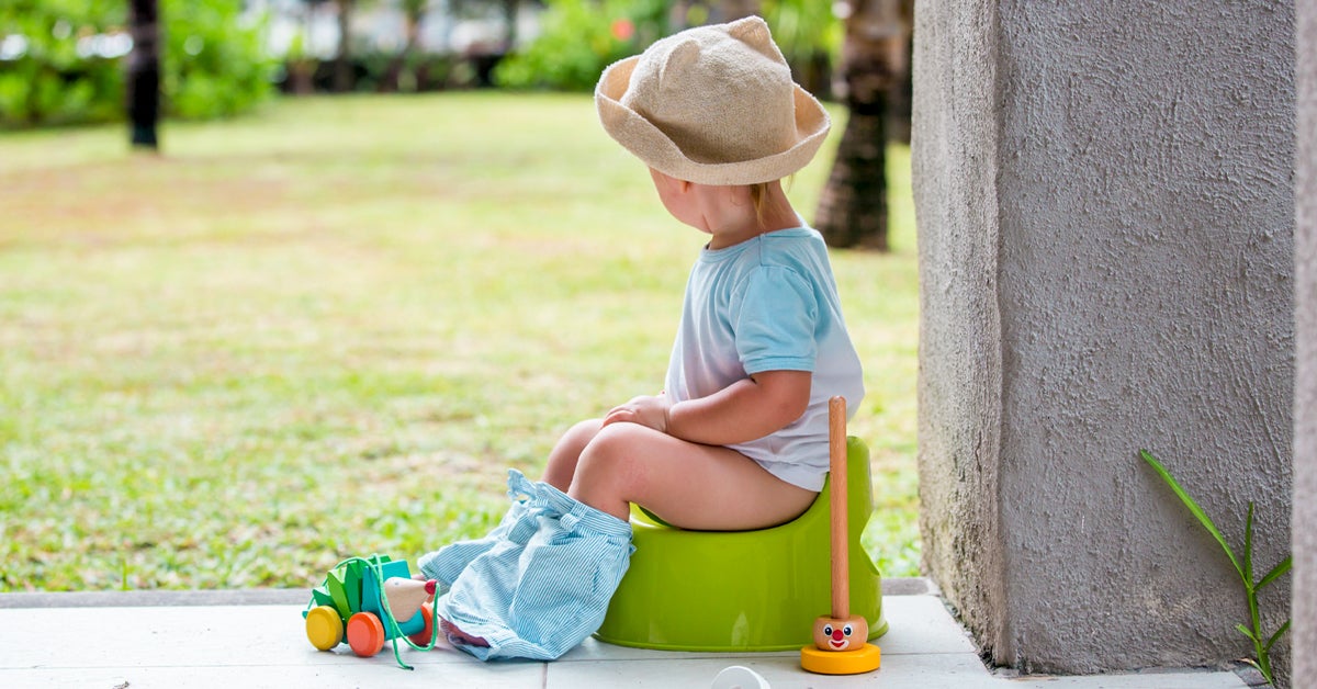 child using the toilet