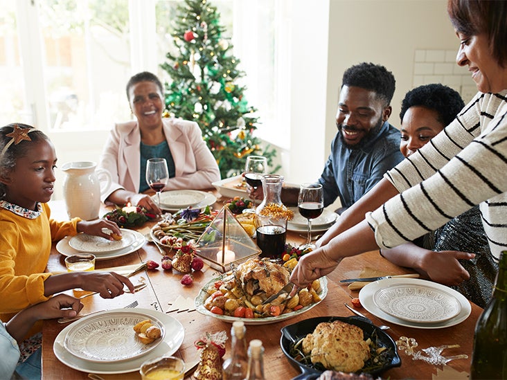 CDC Says Rapid Tests, Vaccines, and Masks Can Help You Stay Safe During the Holidays This Year