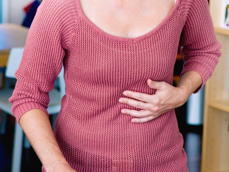 Upper Left Abdominal Pain Under Ribs: Symptoms and 18 Causes