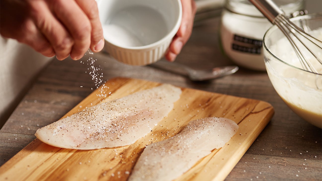 https://post.healthline.com/wp-content/uploads/2020/02/salt-sodium-fish-fillet-cooking-1296x728-header.jpg