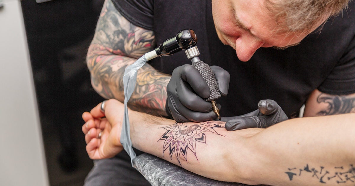 Tattoo Over a Scar: What to Know, Pain Level, and More