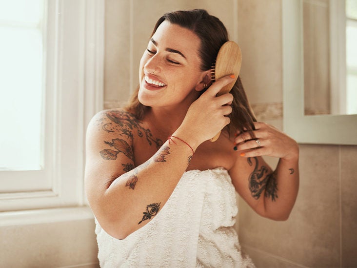 woman brushing hair