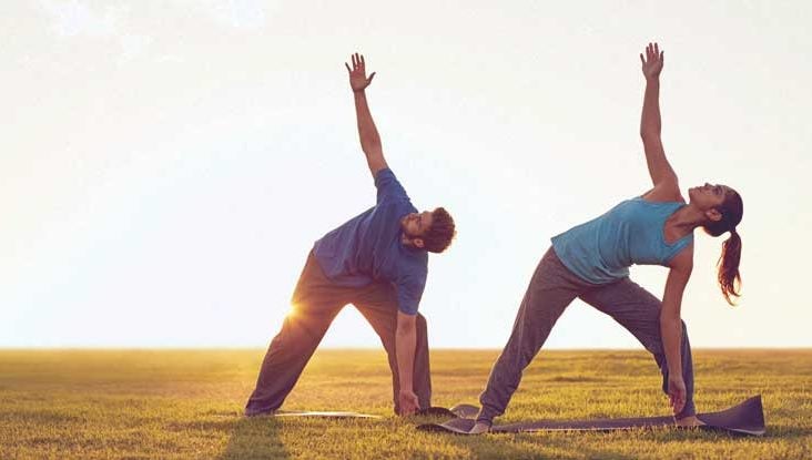 Couples Yoga: 4 Ways It Strengthens Your Relationship