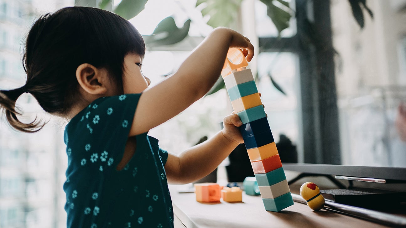 https://post.healthline.com/wp-content/uploads/2020/08/kid-toddler-blocks-playing-1296x728-header.jpg