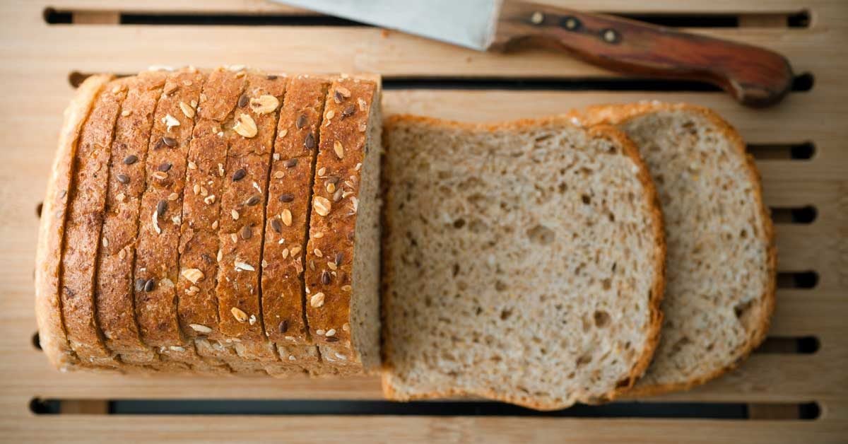 How many calories in a slice of whole grain bread 7 Great Reasons To Add Sprouted Grain Bread To Your Diet