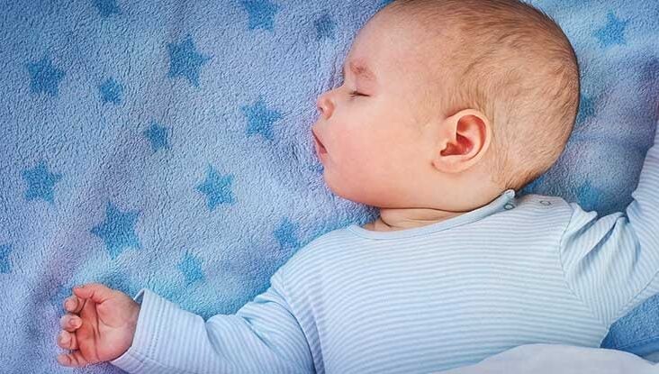 baby sleeping in same bed