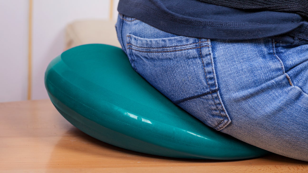 https://post.healthline.com/wp-content/uploads/2020/09/The-butt-sitting-on-a-therapeutic-pillow-1296x728-header.jpg