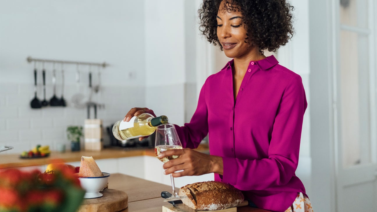 https://post.healthline.com/wp-content/uploads/2020/09/pouring_wine_in_kitchen-1296x728-header.jpg