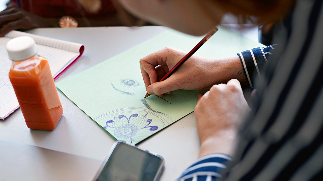 Hand holding open book. Line art. Reading, education concept. Hand