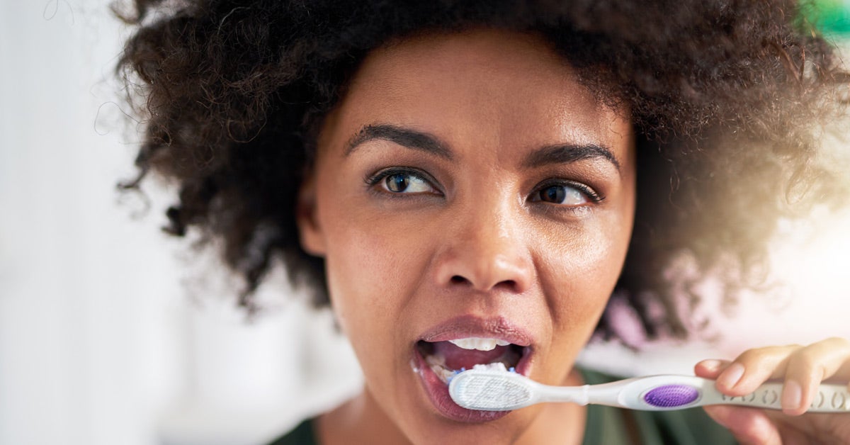 Brushing her teeth