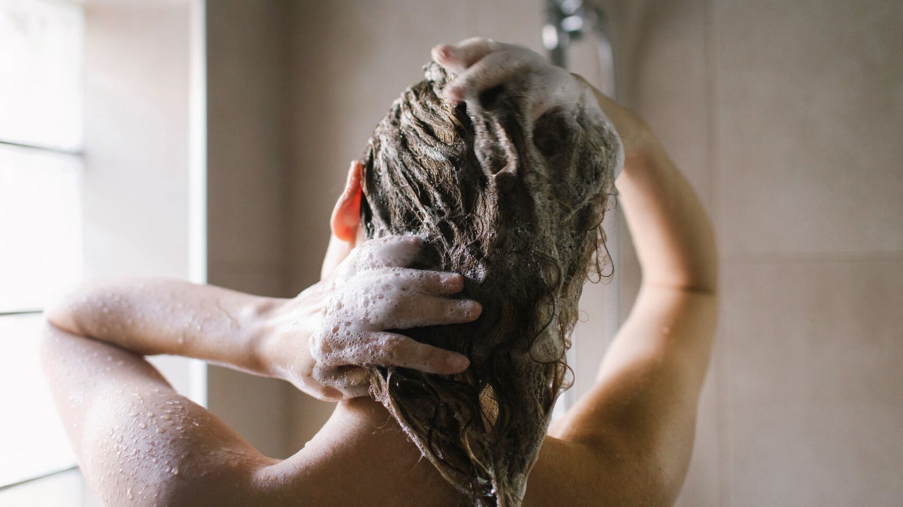 https://post.healthline.com/wp-content/uploads/2021/04/woman-washing-hair-shampoo-shower-1296x728-header.jpg