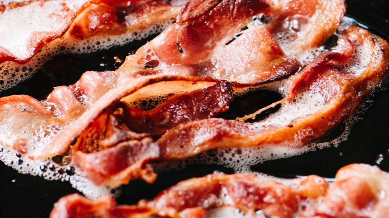 bacon sizzling on a skillet