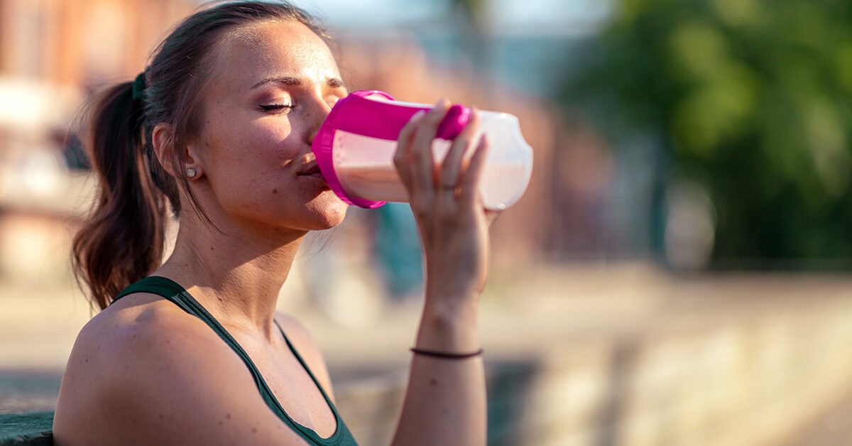 female drinking protein shake 1200 628 facebook