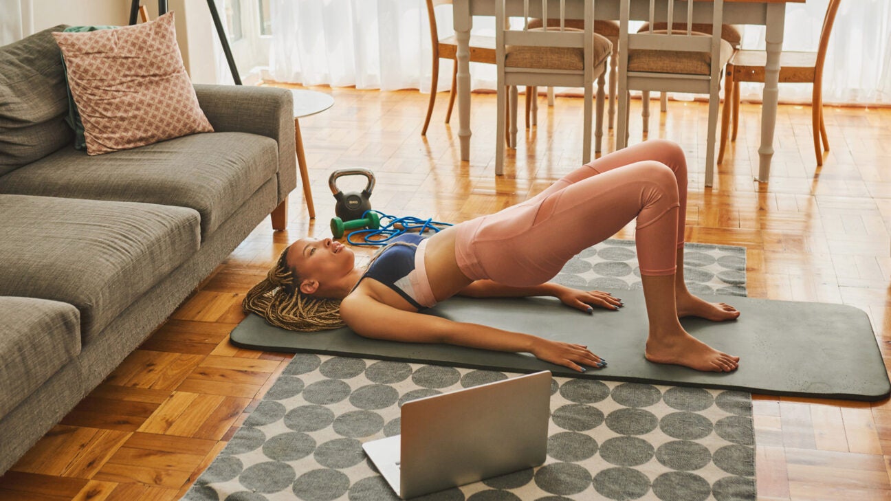 A person is doing leg flexion/extension exercises