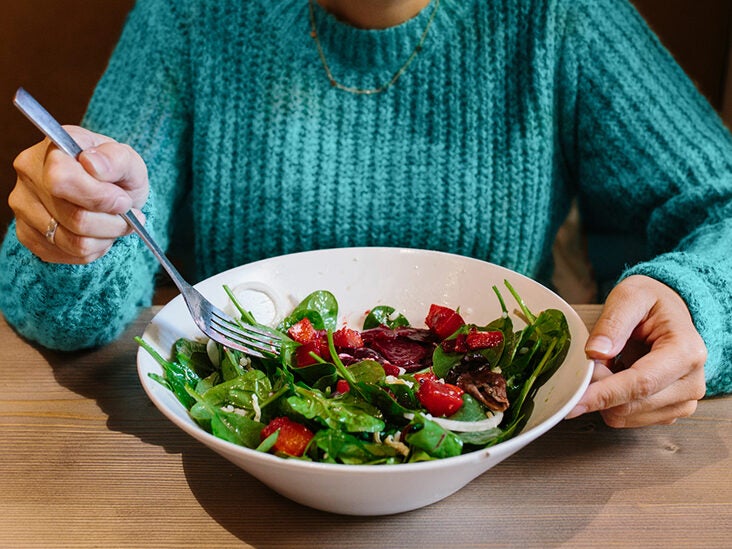 female eating salad bowl 732 549 feature thumb