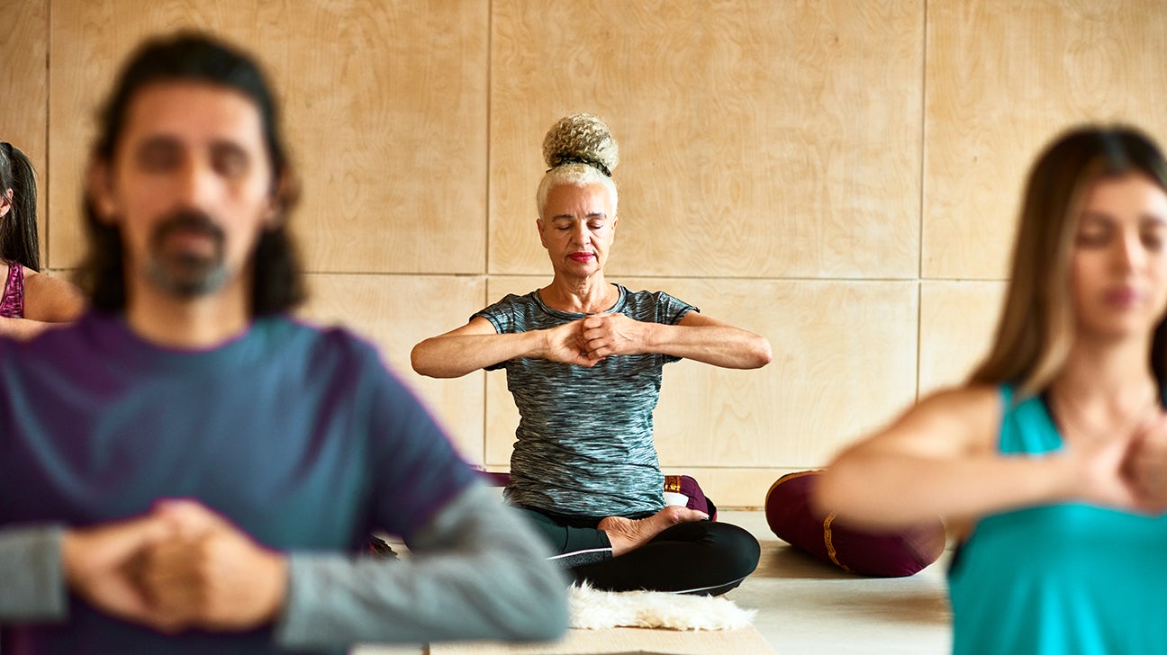 Women meditate, yoga. Psychic women considers mind and heart