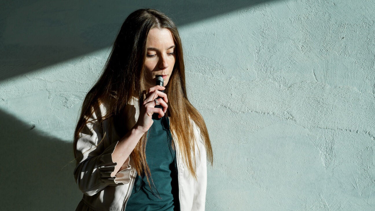 A woman vaping.