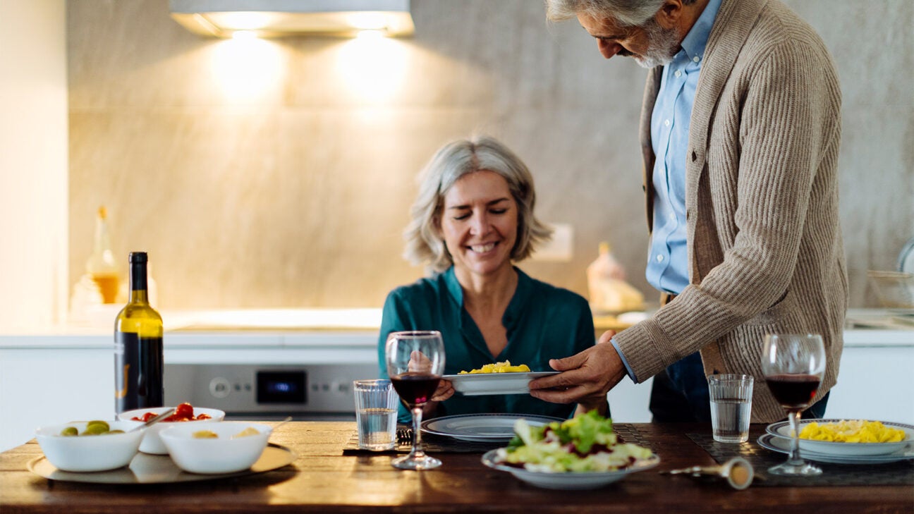 Mature couple having dinner together