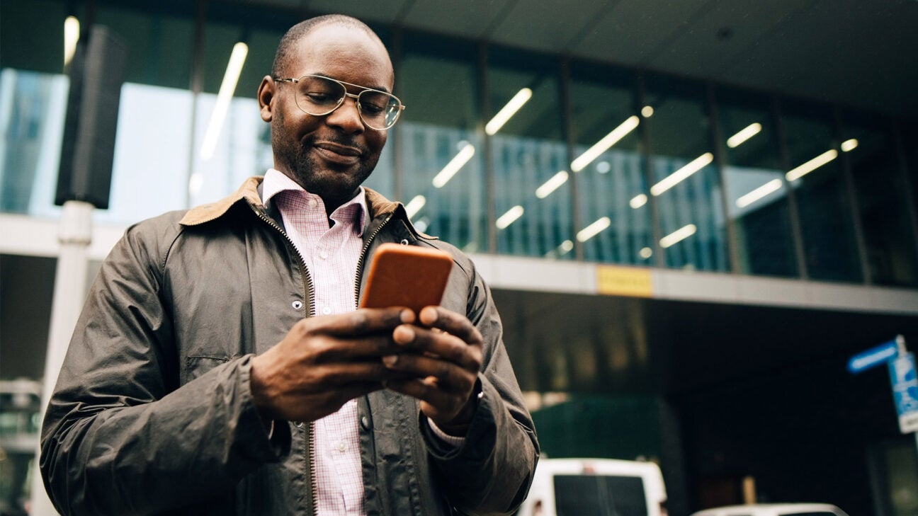 A man using a smartphone.