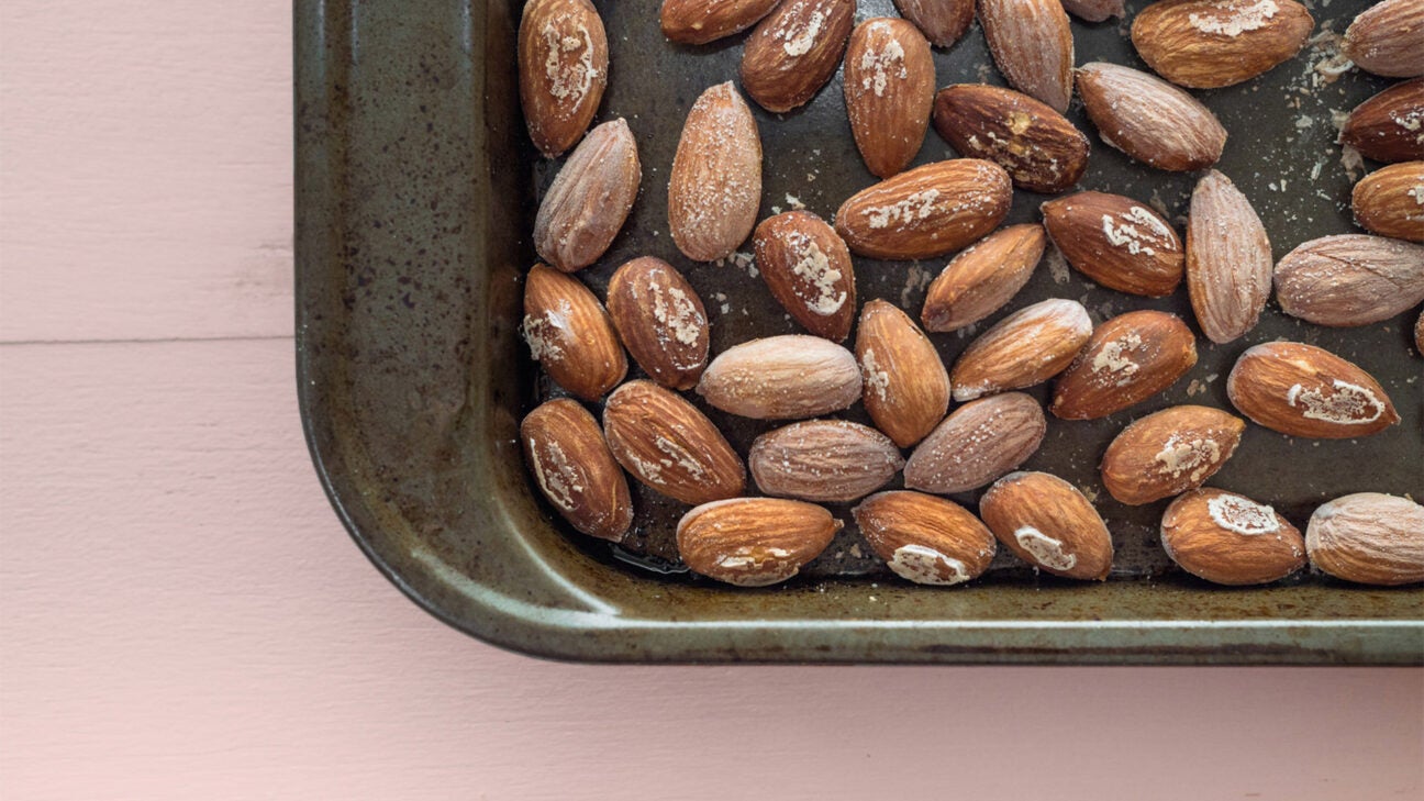 Almonds sitting in a pan