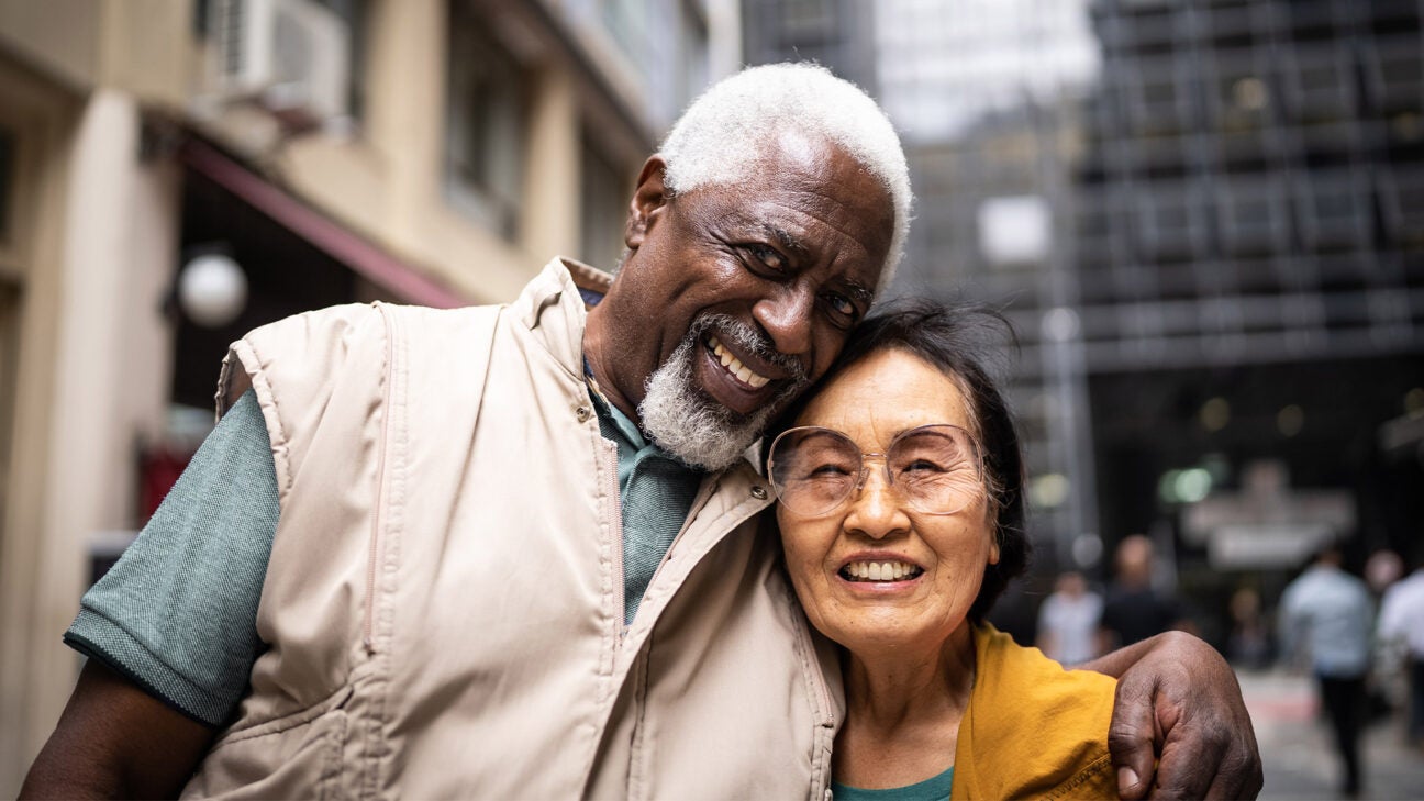 A man and woman sharing a hug.