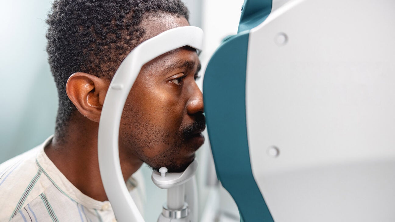 A man undergoes an eye exam.