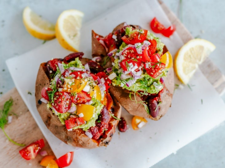 Stuffed Sweet Potatoes with Black Beans, Corn, and Avocado Crema